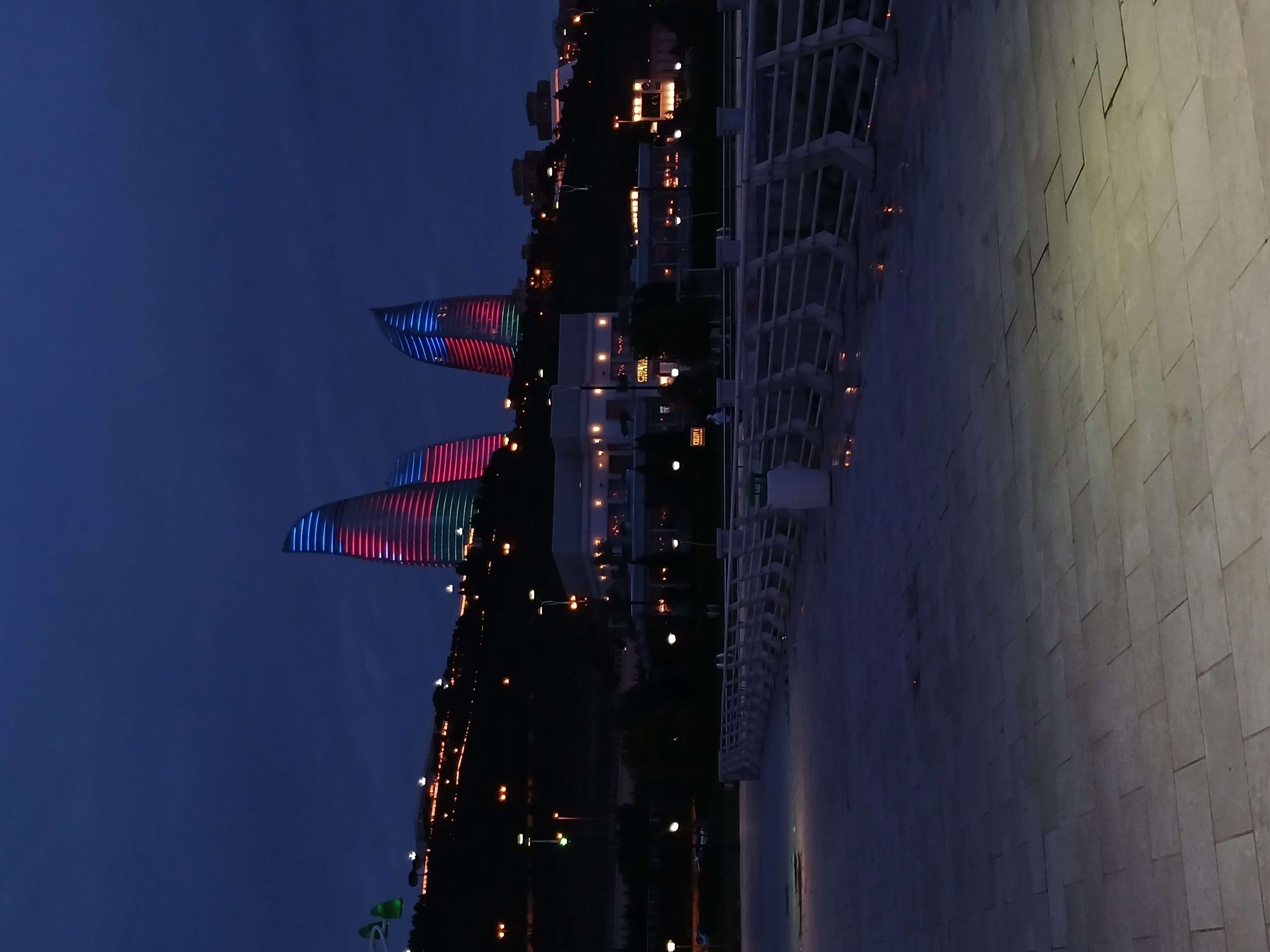Flame Towers illuminated at night in Baku